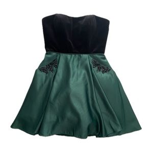 Black velvet and emerald green satin dress